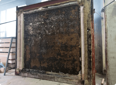 Wooden wall on the side exposed to fire